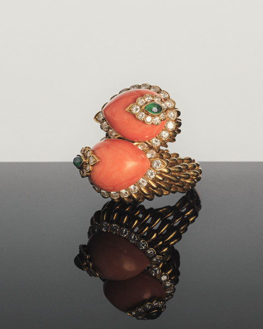 CORAL, EMERALD, AND DIAMOND RING FROM THE COLLECTION OF ELIZABETH TAYLOR